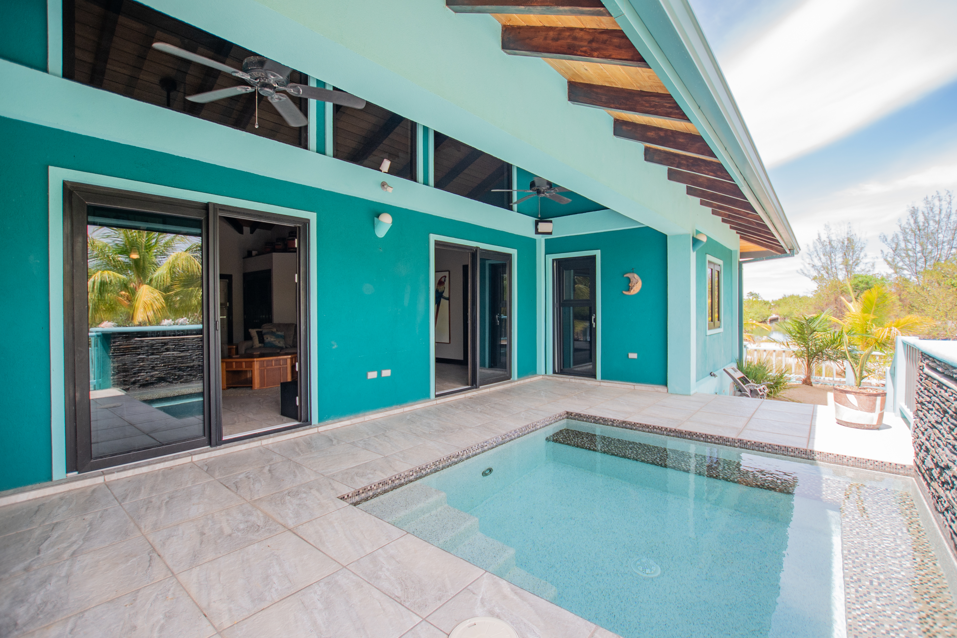 RE/MAX real estate, Belize, Placencia, Modern Luxury Oasis in Placencia: Contemporary Home with Pool and Patios