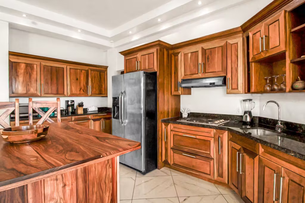 Belizean Exotic Hardwoods Granite Counter Professional Stainless Steel Appliances
