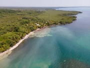 Coastal Bliss Unveiled: 165 Feet of Beachfront Serenity