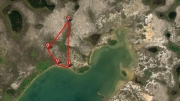 100 Acres in Gales Point on the Lagoon
