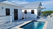 2 Homes with pool and boat slip in a gated community