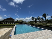 Prime Canal-Front Lot with Large Pool in Gated Community